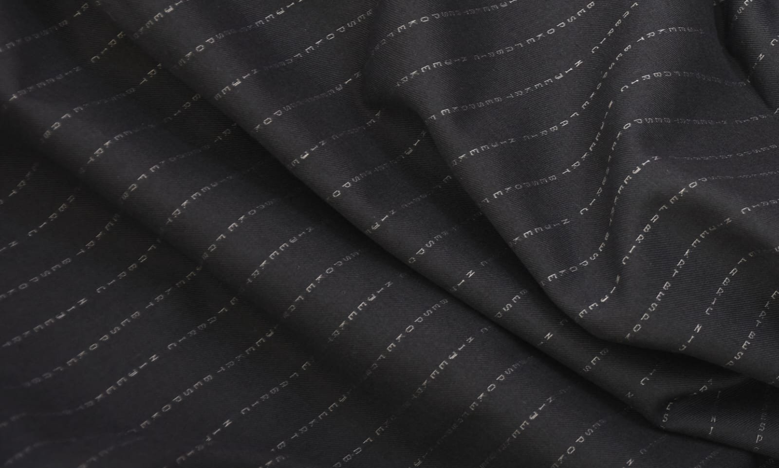 100% wool NameWoven bespoke suit fabric with personalized name letters